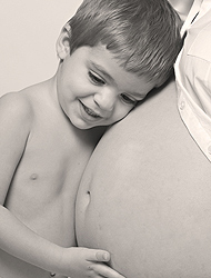 pregnant woman with small child